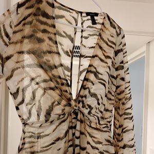 New without tag top. Animal print
